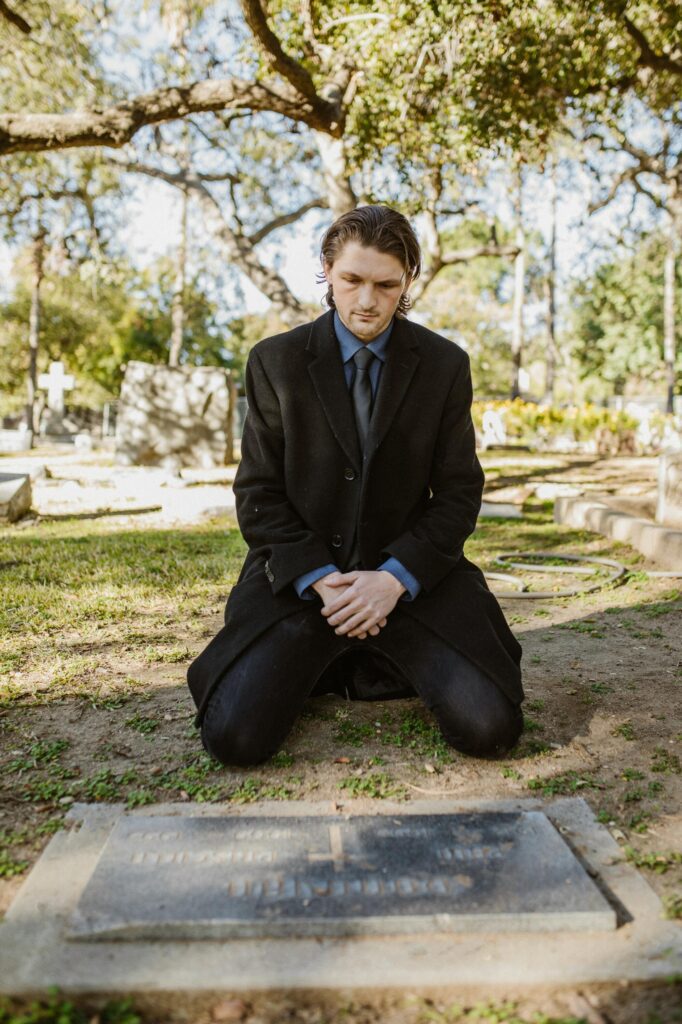 man by gravesite for Mental Health Moment Video Coping with Grief and Loss